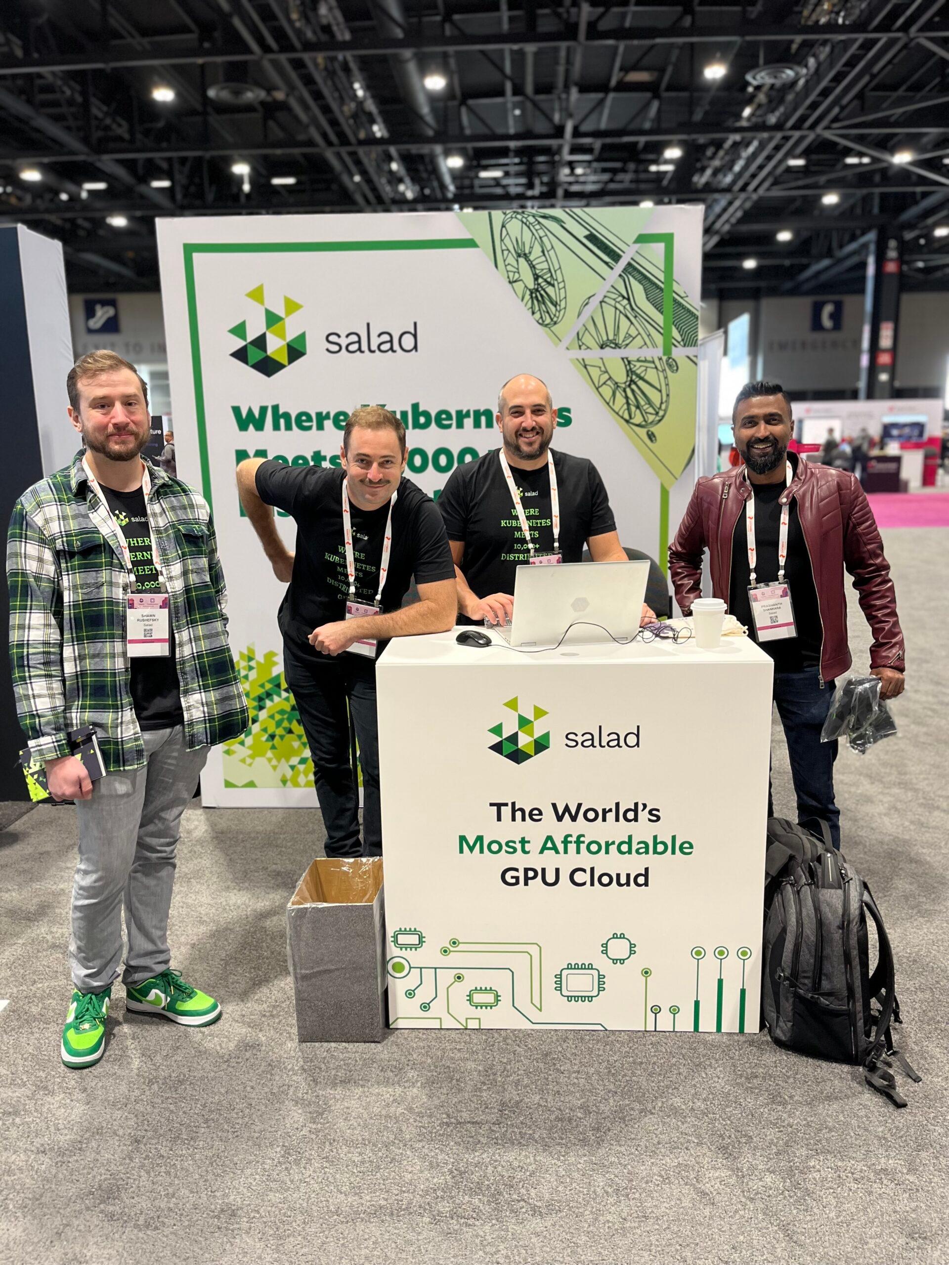 Four Salad team members at the booth, under a Where Kubernetes Meets 10,000+ banner and beside a The World's Most Affordable GPU Cloud sign